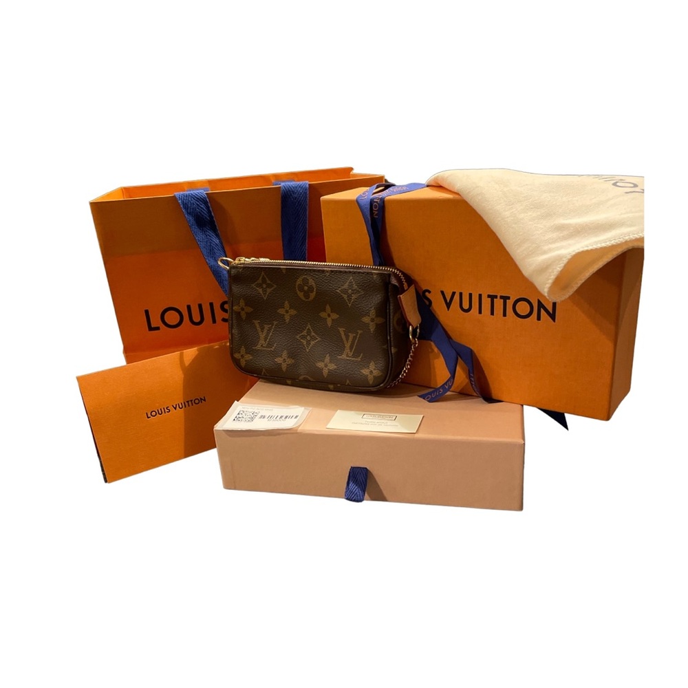 Louis Vuitton Mini Pochette - one of the hottest, hardest to find bags by LV.